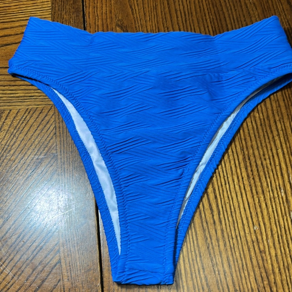 RHYTHM TEXTURED BLUE SWIM BIKINI BOTTOM. NWT. SIZE SMALL